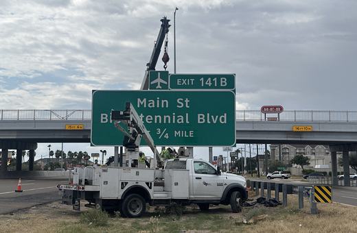Overhead sign lighting